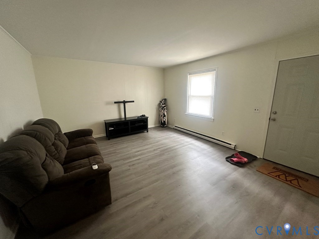 477 White Hall Road Keysville, VA 23947 - Photo 11 of 12 a living room with furniture and a window