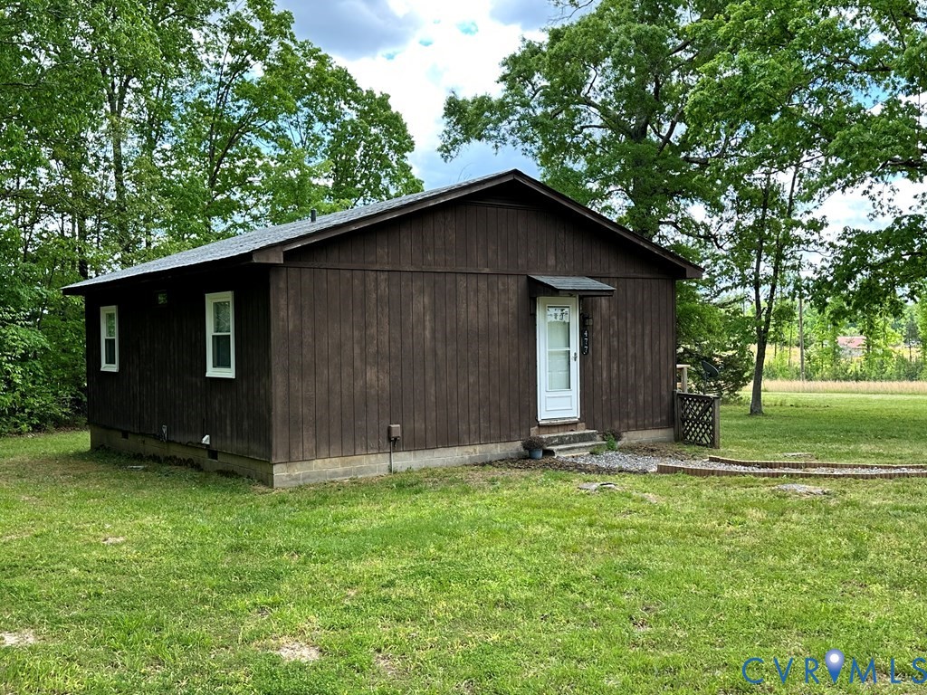 477 White Hall Road Keysville, VA 23947 - Photo 3 of 12 a backyard of a house with lots of green space