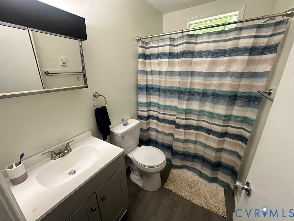 477 White Hall Road Keysville, VA 23947 - Photo 6 of 12 a bathroom with a sink toilet and shower