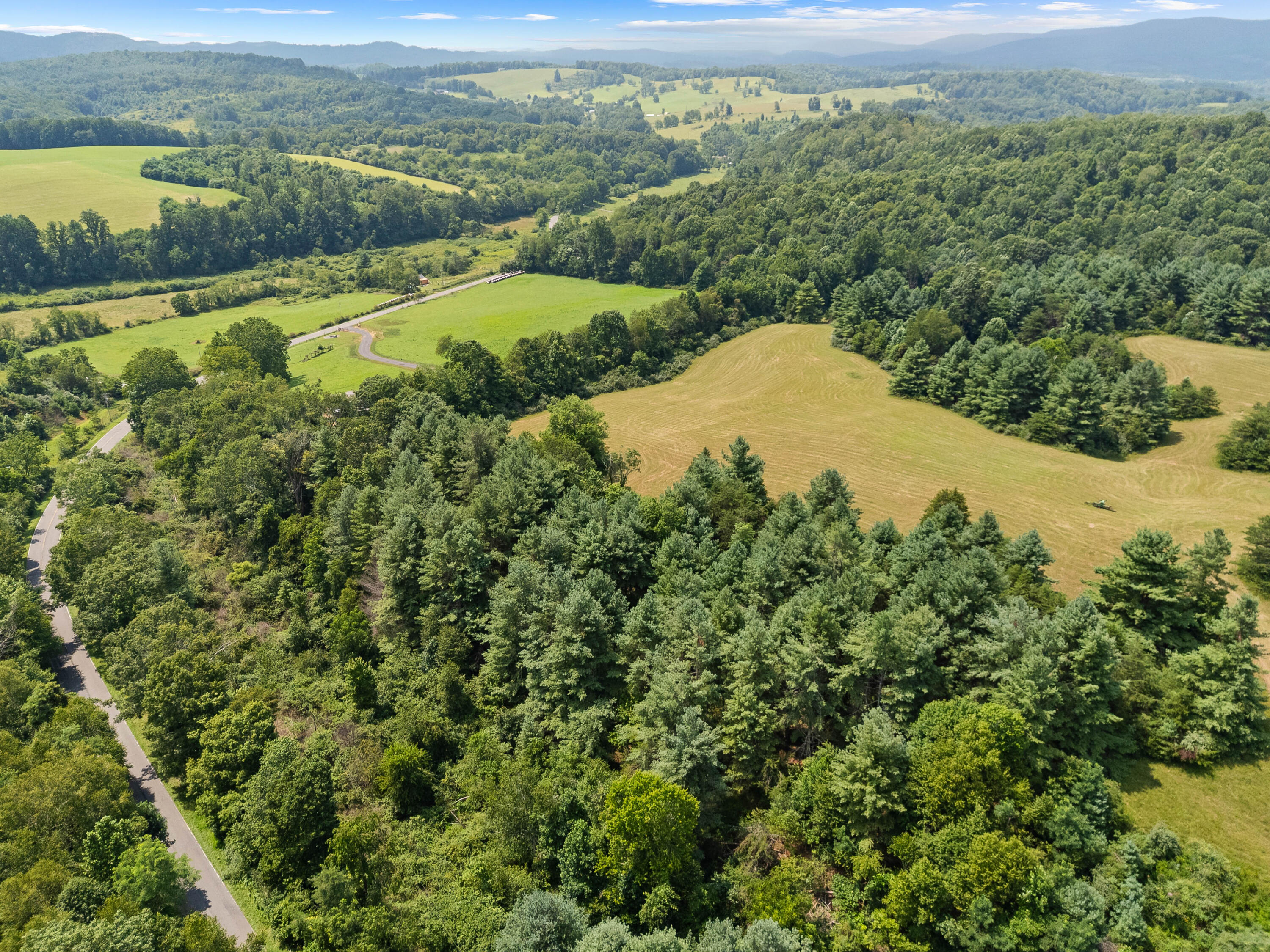 0 Canning Factory Road Southwest Floyd, VA 24091 - Photo 15 of 49 an aerial view of a houses with a yard
