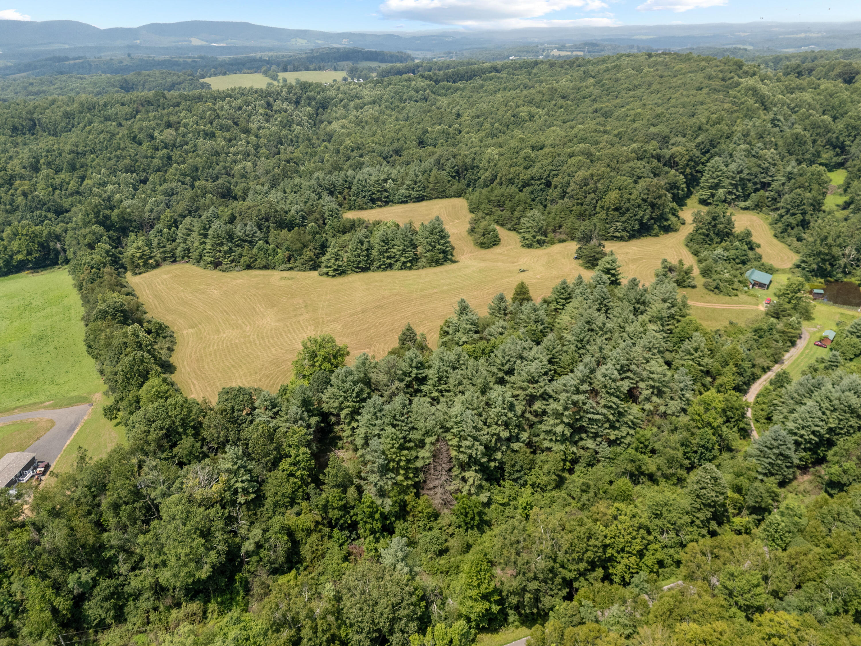 0 Canning Factory Road Southwest Floyd, VA 24091 - Photo 4 of 49 a view of a field with an ocean view