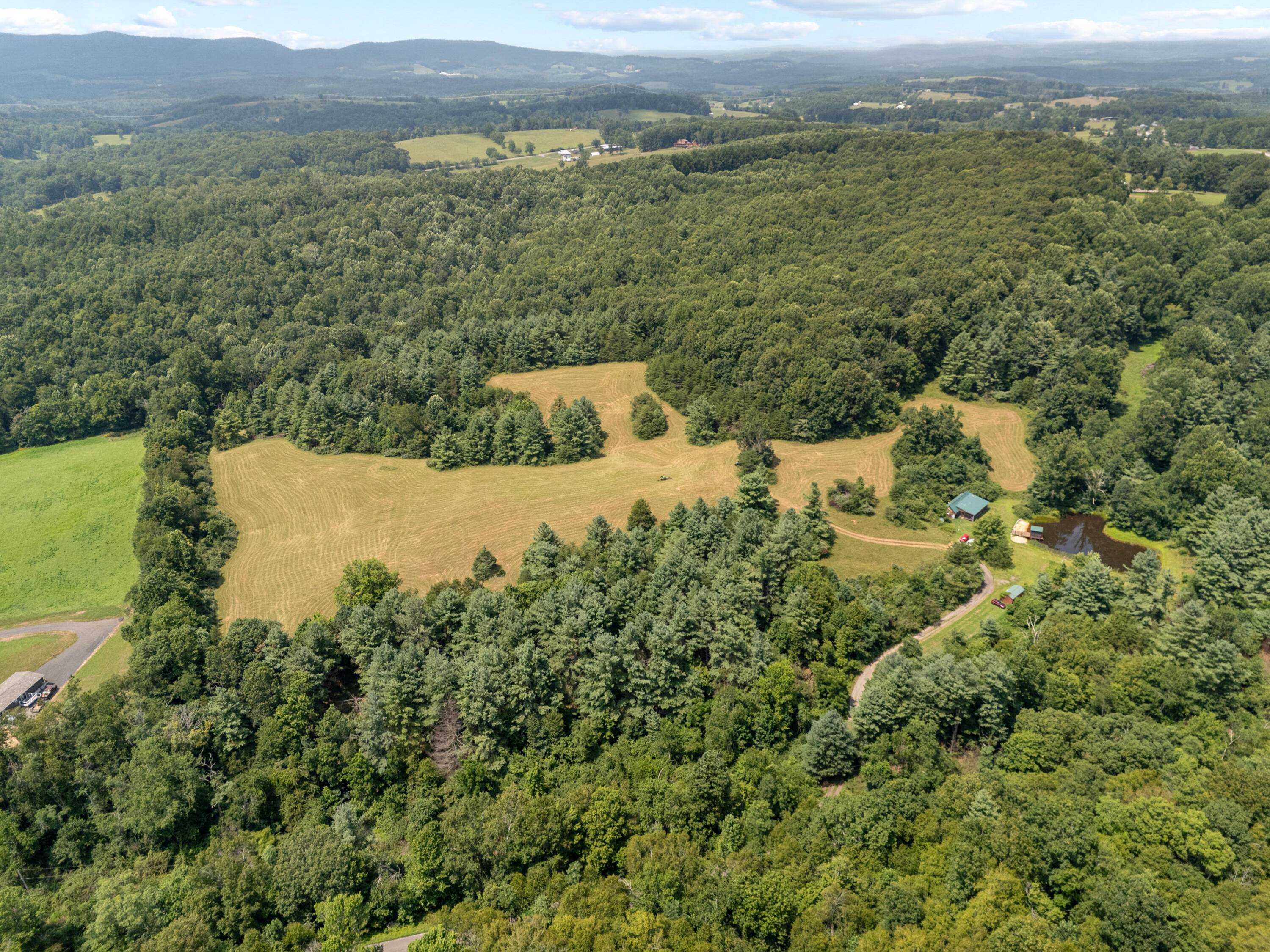 0 Canning Factory Road Southwest Floyd, VA 24091 - Photo 5 of 49 an aerial view of mountain with trees around