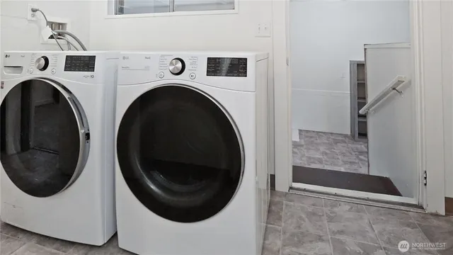 a view of an house with backyard space and garden