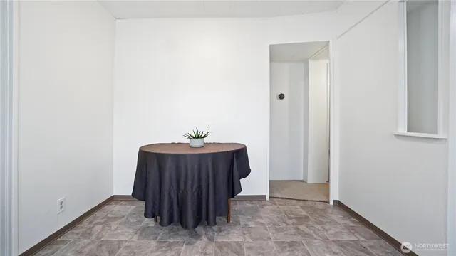 a view of hallway with wooden floor