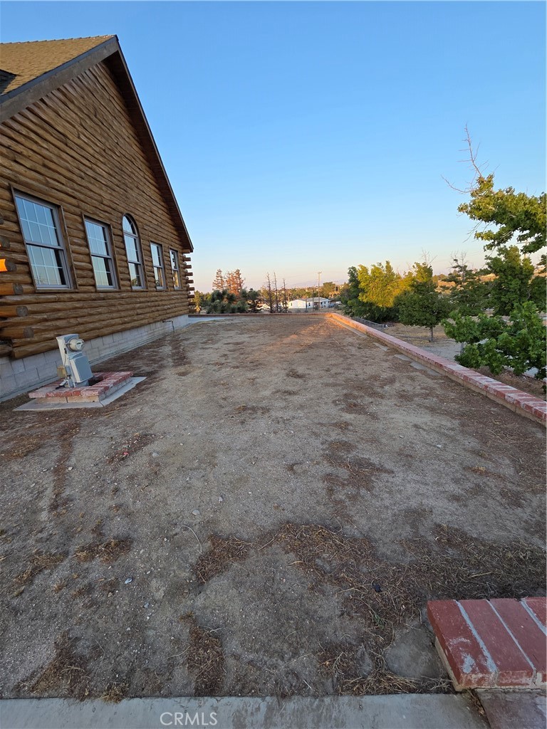 5480 Sunnyslope Road Phelan, CA 92371 - Photo 44 of 47 a view of a house with a yard