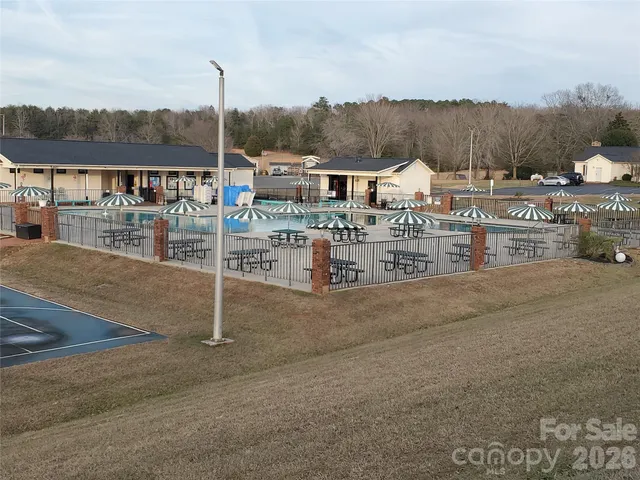 a view of a house with a park