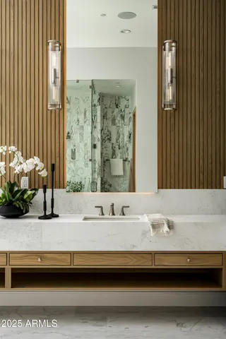 a bathroom with a bathtub and a sink