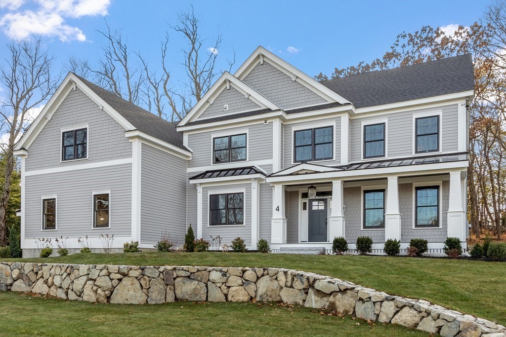 front view of a house with a yard