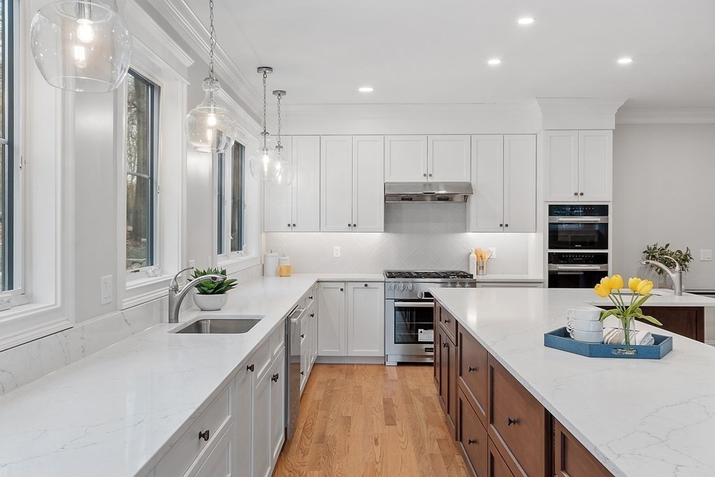 4 Mill Brook Road Lexington, MA 02420 - Photo 13 of 42 a kitchen with a sink stove and refrigerator