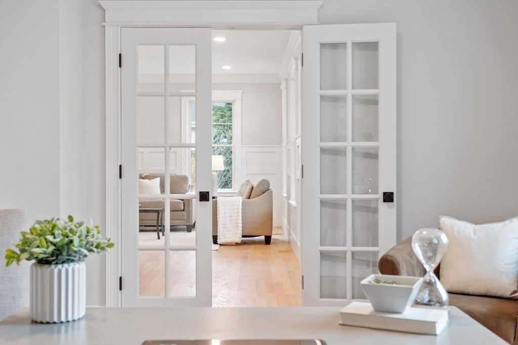 4 Mill Brook Road Lexington, MA 02420 - Photo 17 of 42 a living room with furniture and a potted plant