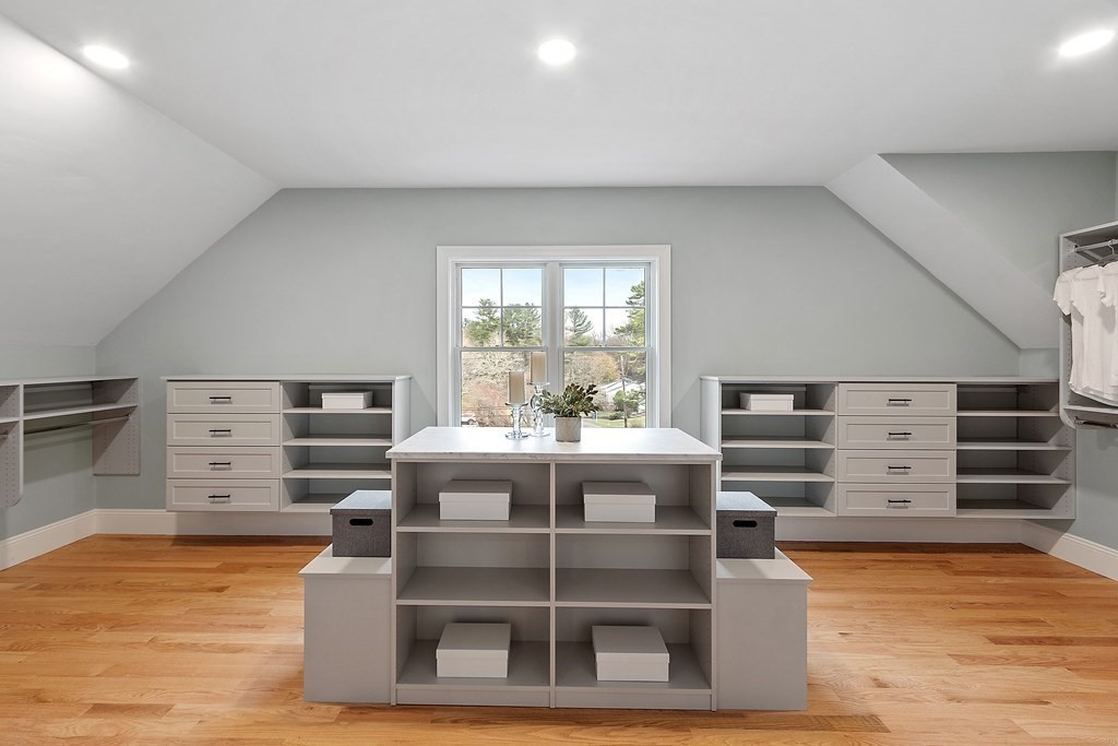 4 Mill Brook Road Lexington, MA 02420 - Photo 22 of 42 a view of a room with wooden floor and staircase