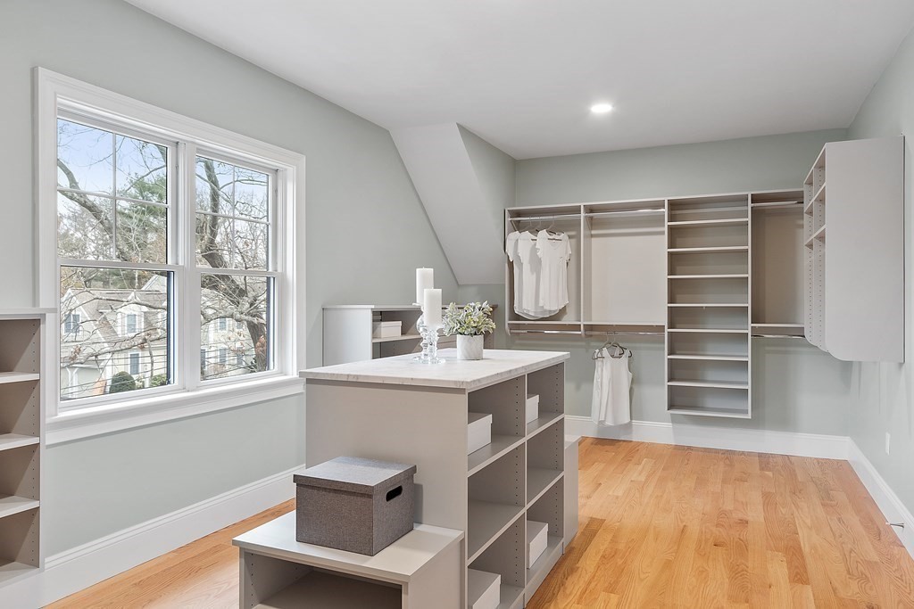 4 Mill Brook Road Lexington, MA 02420 - Photo 23 of 42 a view of a kitchen with wooden floor and electronic appliances