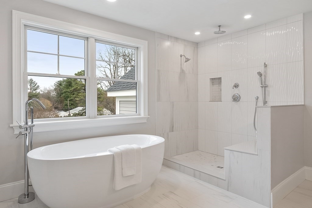 4 Mill Brook Road Lexington, MA 02420 - Photo 26 of 42 a bathroom with a bathtub and shower