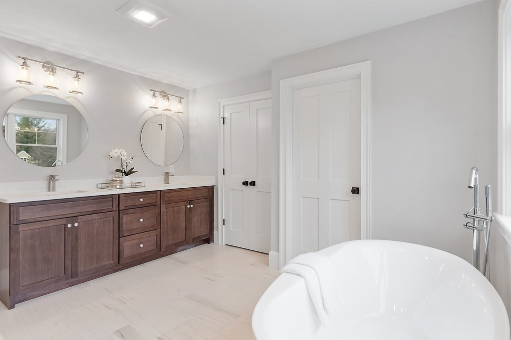 4 Mill Brook Road Lexington, MA 02420 - Photo 27 of 42 a spacious bathroom with a double vanity sink mirror and double