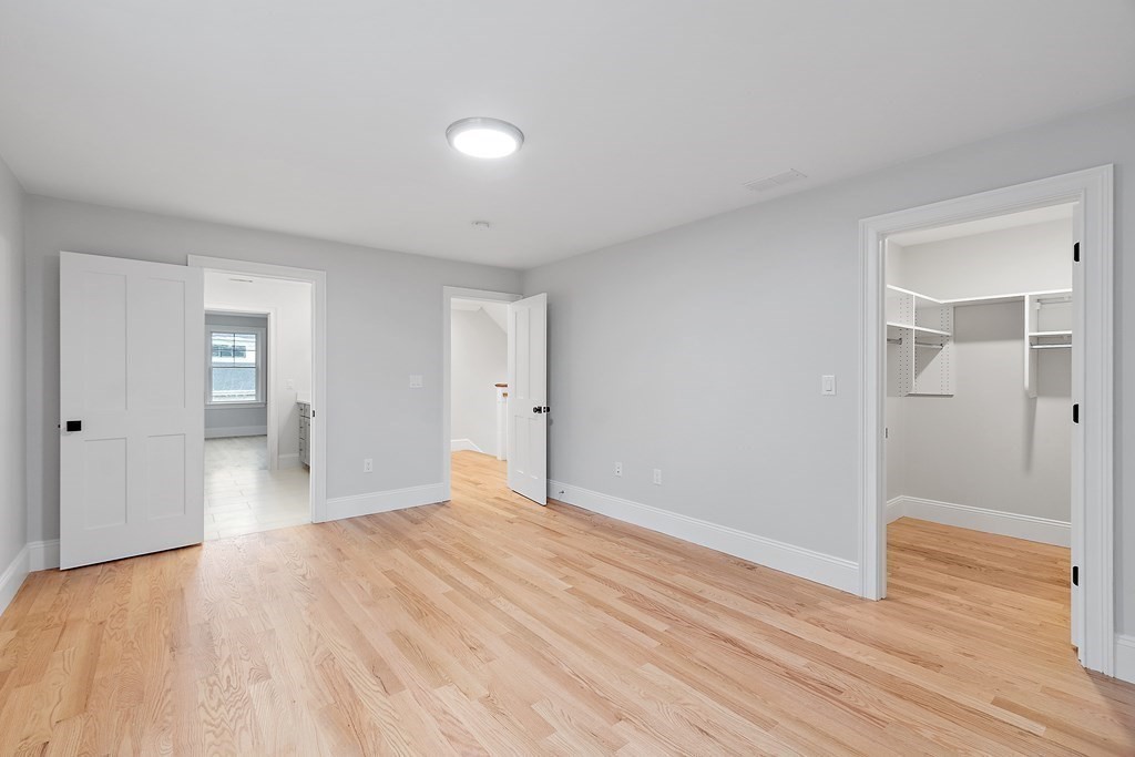 4 Mill Brook Road Lexington, MA 02420 - Photo 29 of 42 a view of empty room with wooden floor