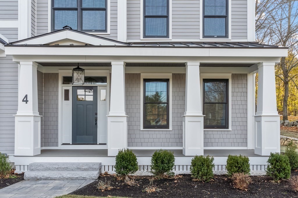 4 Mill Brook Road Lexington, MA 02420 - Photo 3 of 42 front view of a brick house