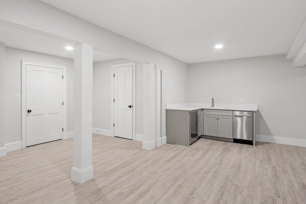 4 Mill Brook Road Lexington, MA 02420 - Photo 35 of 42 a view of a kitchen with a sink and a refrigerator