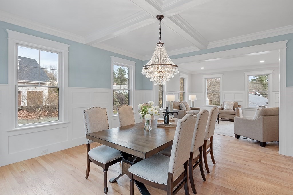 4 Mill Brook Road Lexington, MA 02420 - Photo 6 of 42 a view of a dining room with furniture a chandelier and wooden floor