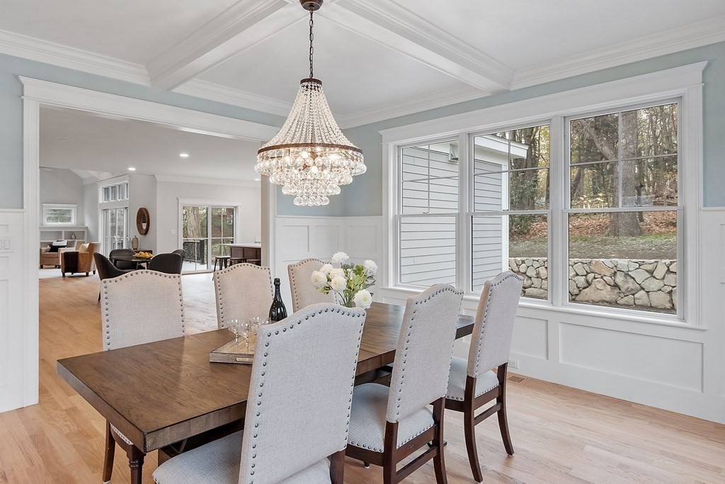 4 Mill Brook Road Lexington, MA 02420 - Photo 7 of 42 a view of a dining room with furniture window and wooden floor