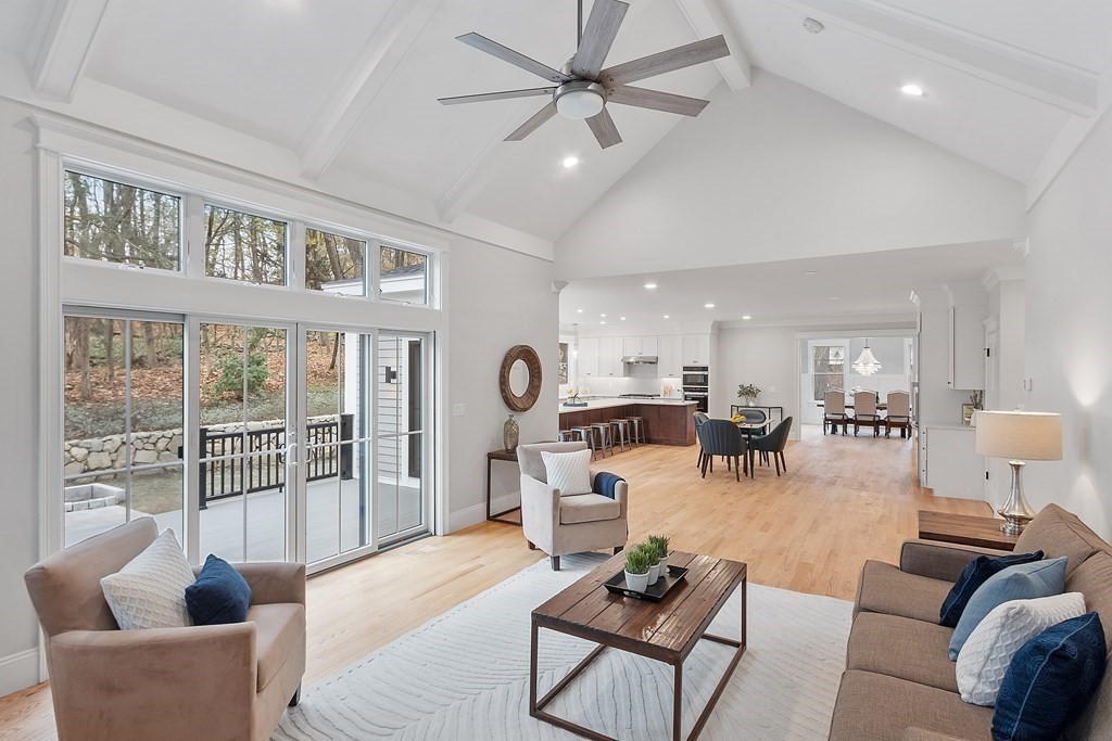 4 Mill Brook Road Lexington, MA 02420 - Photo 8 of 42 a living room with furniture and a large window