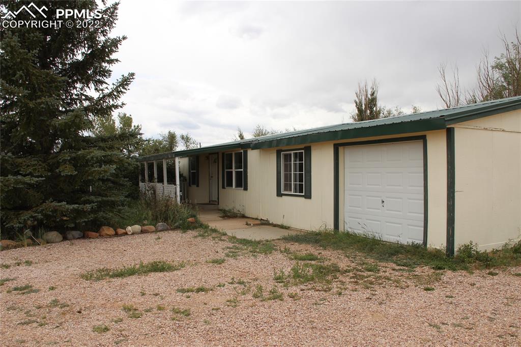 11905 Paint Mine Road Calhan, CO 80808 - Photo 25 of 35 a backyard of a house
