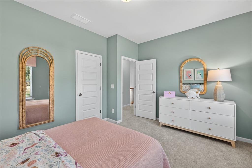 17 North Haven Drive Rome, GA 30165 - Photo 28 of 41 a bedroom with a bed and a dresser