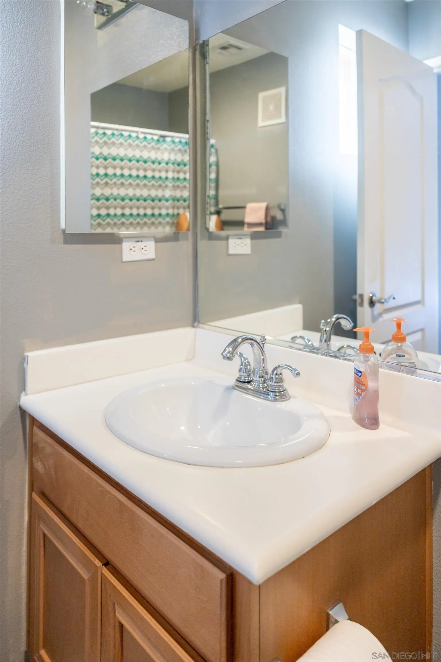 30 Via Sovana Santee, CA 92071 - Photo 12 of 23 a bathroom with a sink and a mirror