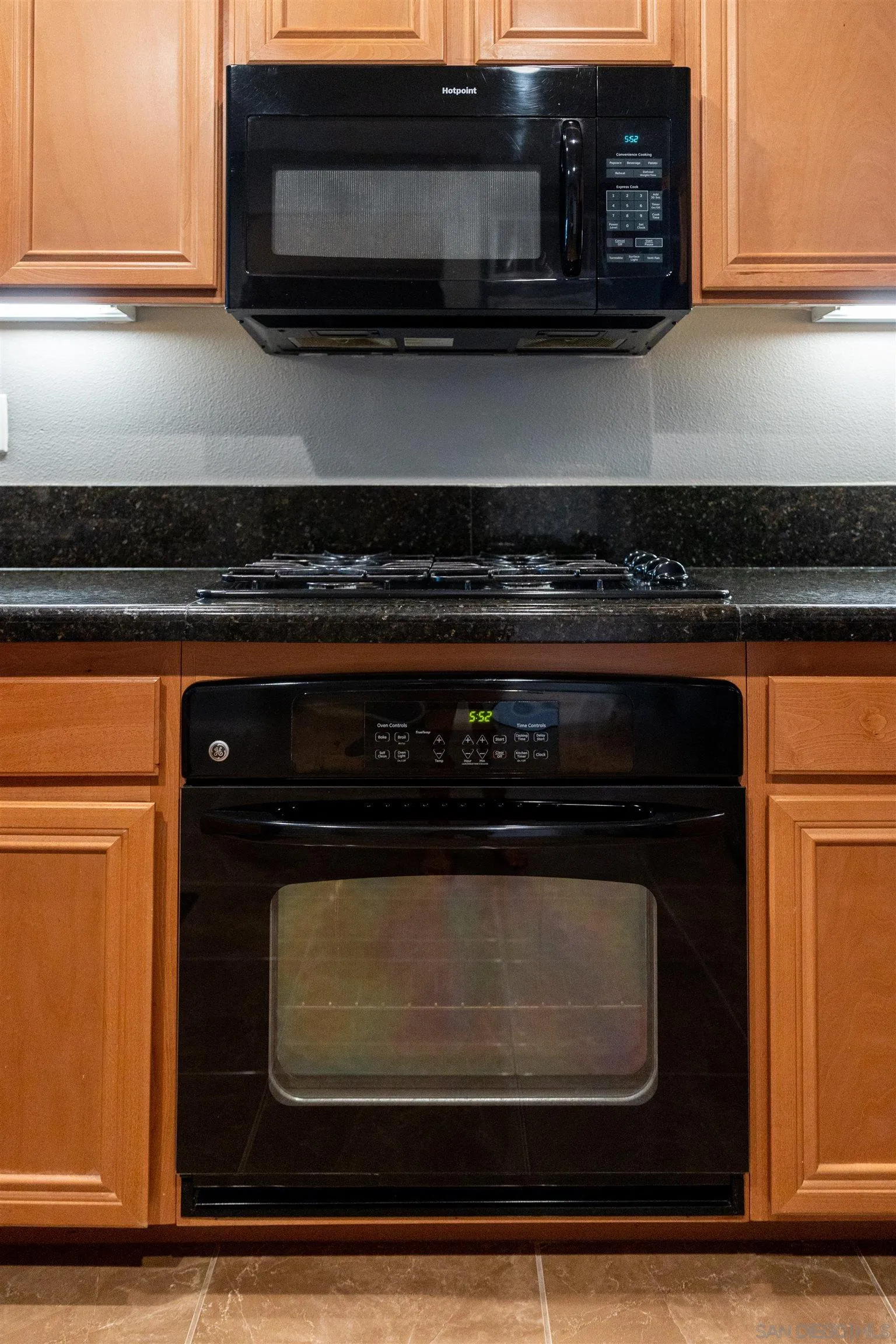 30 Via Sovana Santee, CA 92071 - Photo 20 of 23 a stove top oven sitting inside of a kitchen