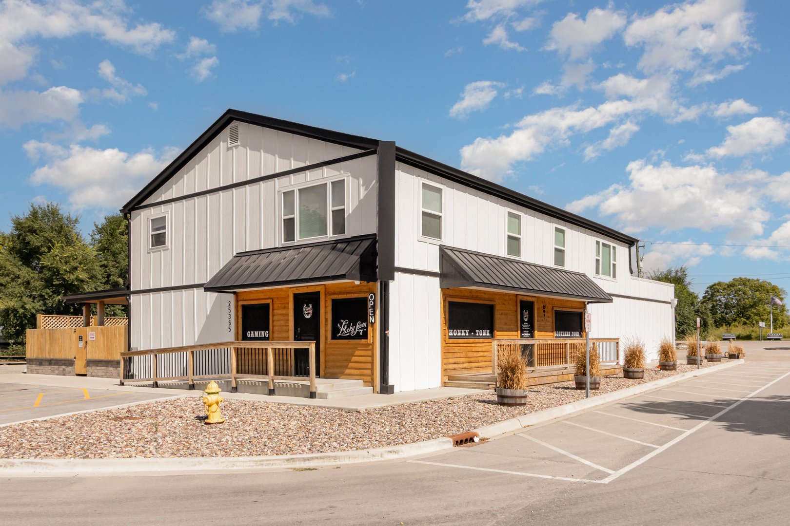 25365 South Fryer Street, Unit 1 Channahon, IL 60410 - Photo 1 of 15 a front view of a house with a garden