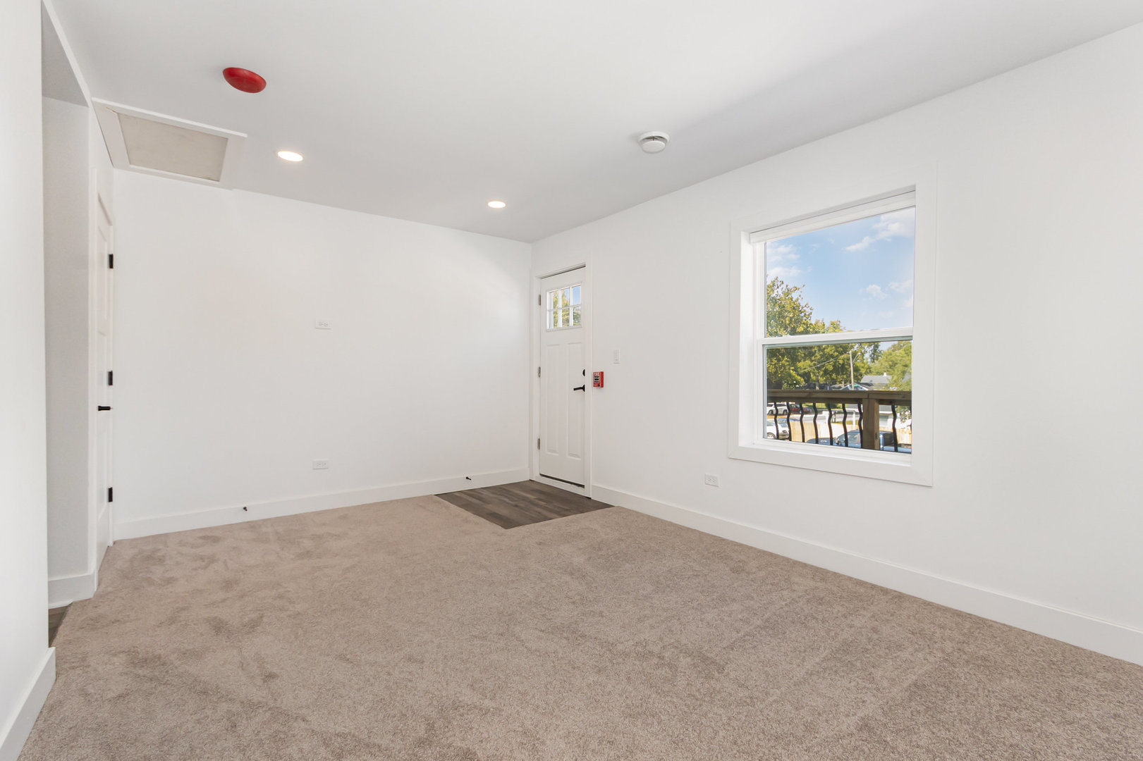 25365 South Fryer Street, Unit 1 Channahon, IL 60410 - Photo 4 of 15 an empty room with a window