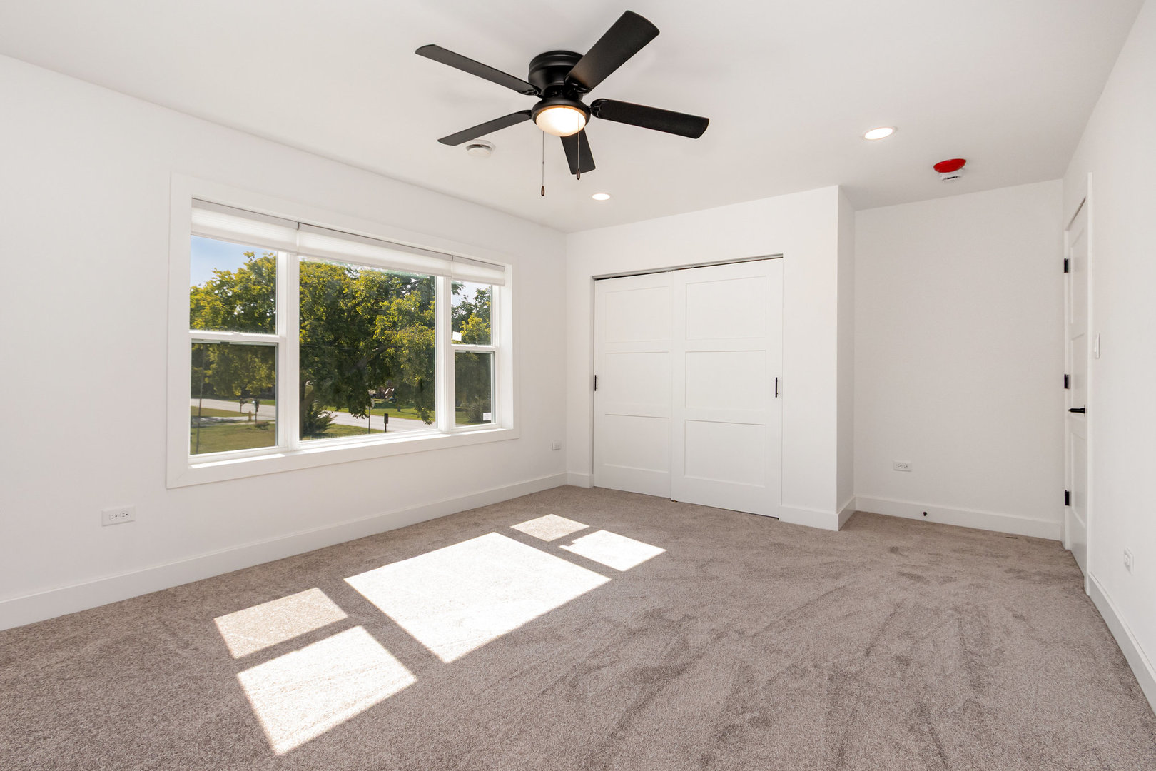 25365 South Fryer Street, Unit 1 Channahon, IL 60410 - Photo 8 of 15 a view of an empty room with a window