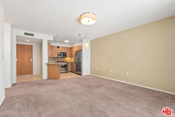 a view of a kitchen with a sink