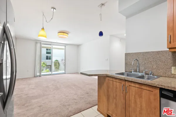 a bathroom with a sink and a window