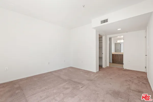 an empty room with an entryway