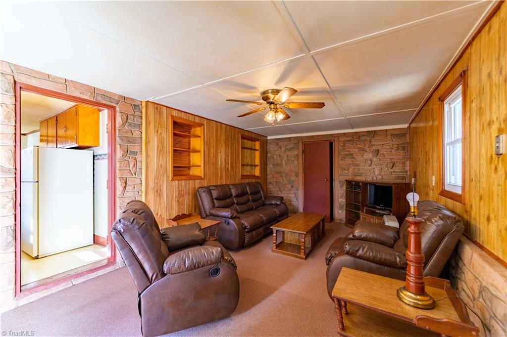 1463 Cb Eller School Road Elkin, NC 28621 - Photo 5 of 50 Cozy family room with extra storage room