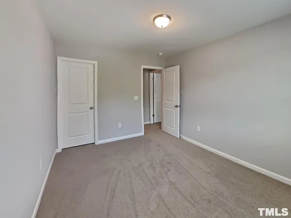 an empty room with an entryway