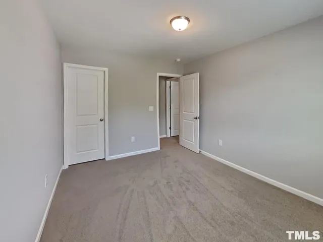 an empty room with an entryway