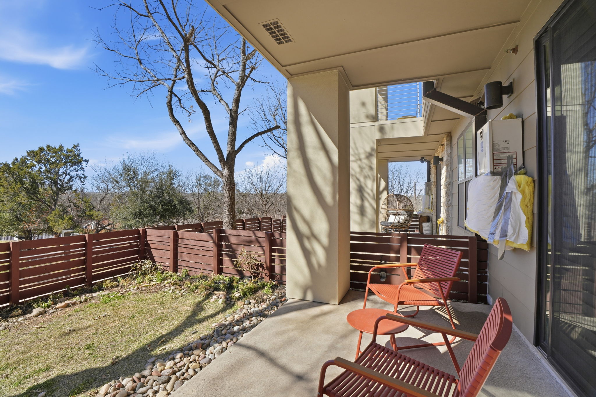 2805 Dulce Lane, Unit 1002 Austin, TX 78704 - Photo 14 of 24 Fenced backyard with a patio area