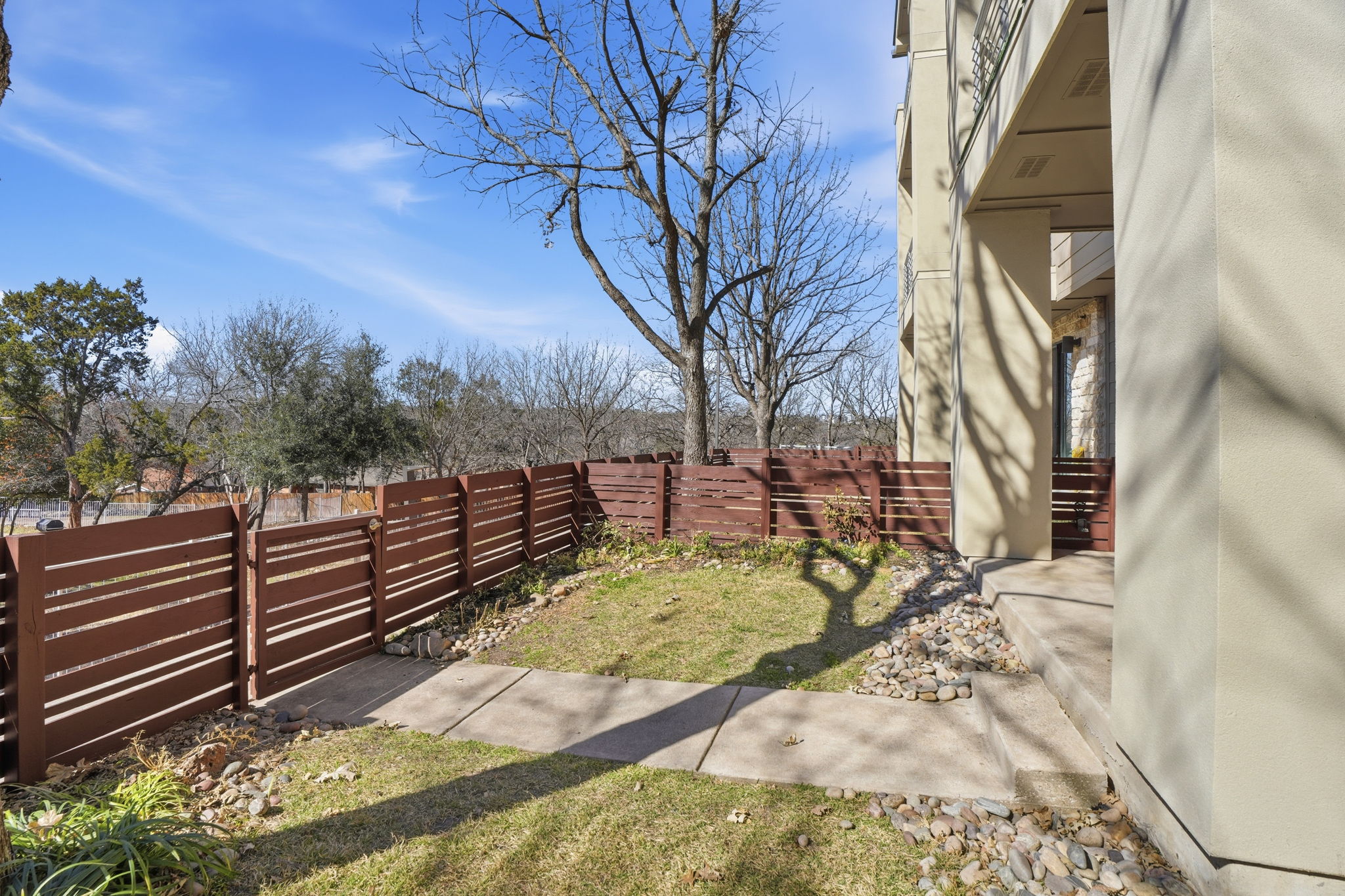 2805 Dulce Lane, Unit 1002 Austin, TX 78704 - Photo 16 of 24 View of fenced backyard