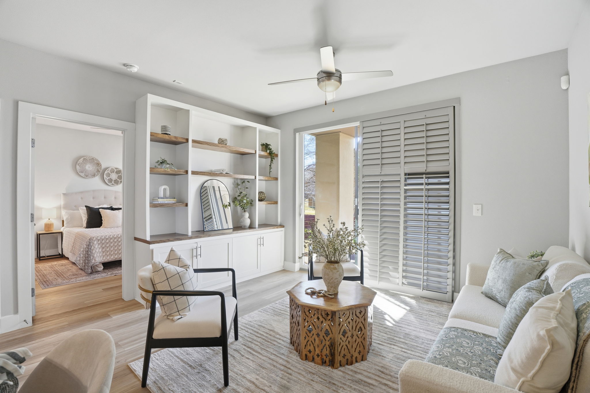 2805 Dulce Lane, Unit 1002 Austin, TX 78704 - Photo 2 of 23 Living area featuring wood finished floors and a ceiling fan