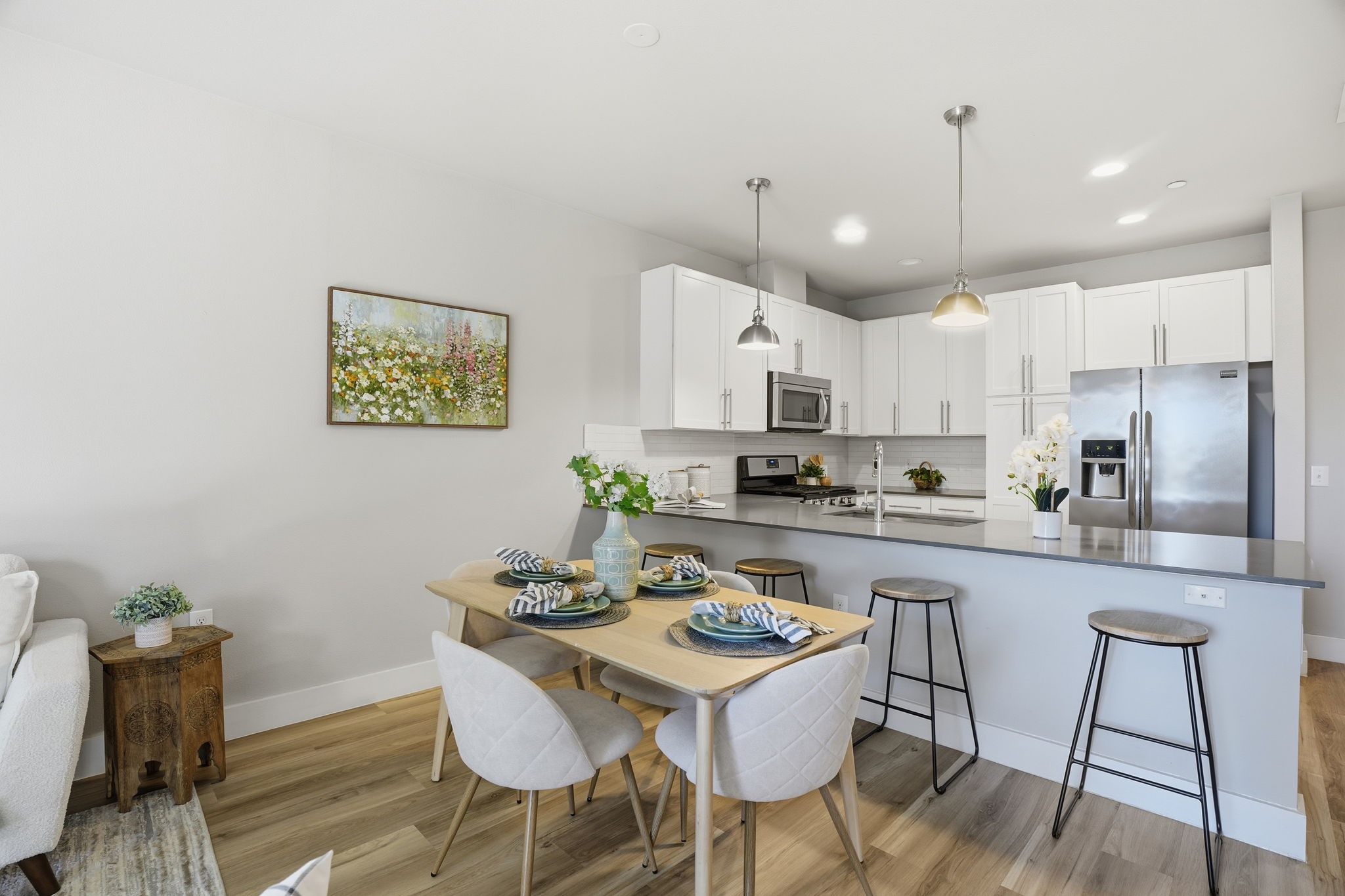 2805 Dulce Lane, Unit 1002 Austin, TX 78704 - Photo 7 of 23 Dining area featuring light wood-style floors and recessed lighting