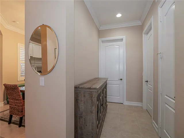 a view of a bathroom with a sink and a mirror