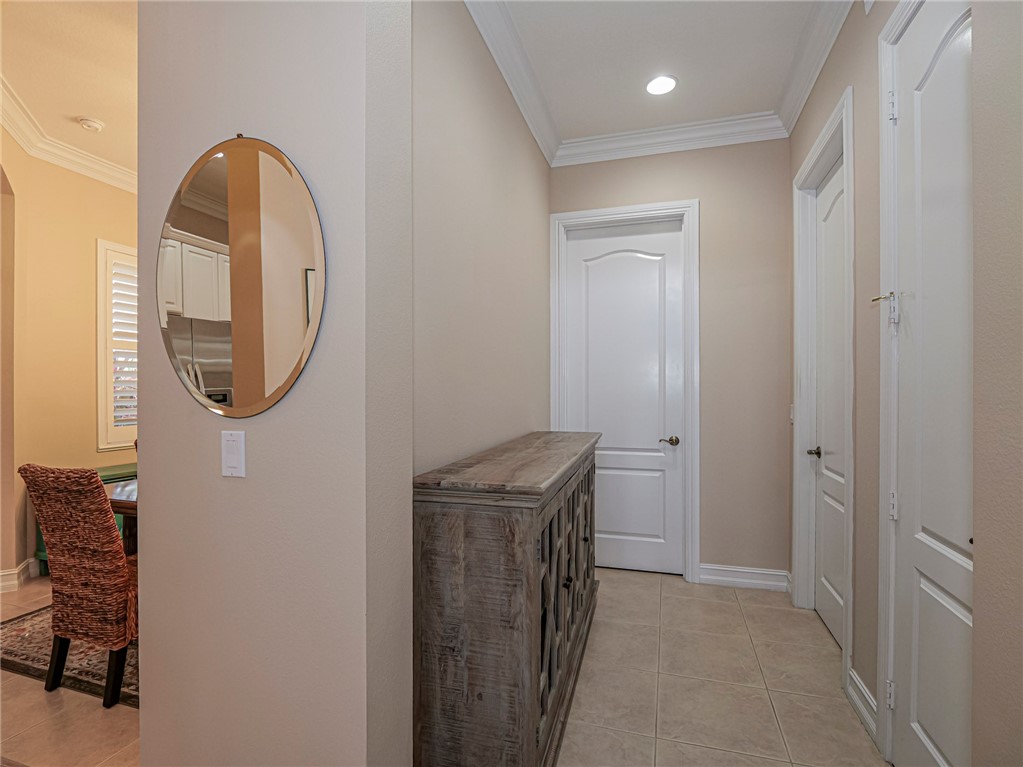 4570 Bridgepointe Way, Unit 148 Vero Beach, FL 32967 - Photo 13 of 32 a view of a bathroom with a sink and a mirror