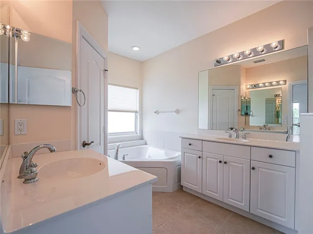 a bathroom with a sink and a bathtub