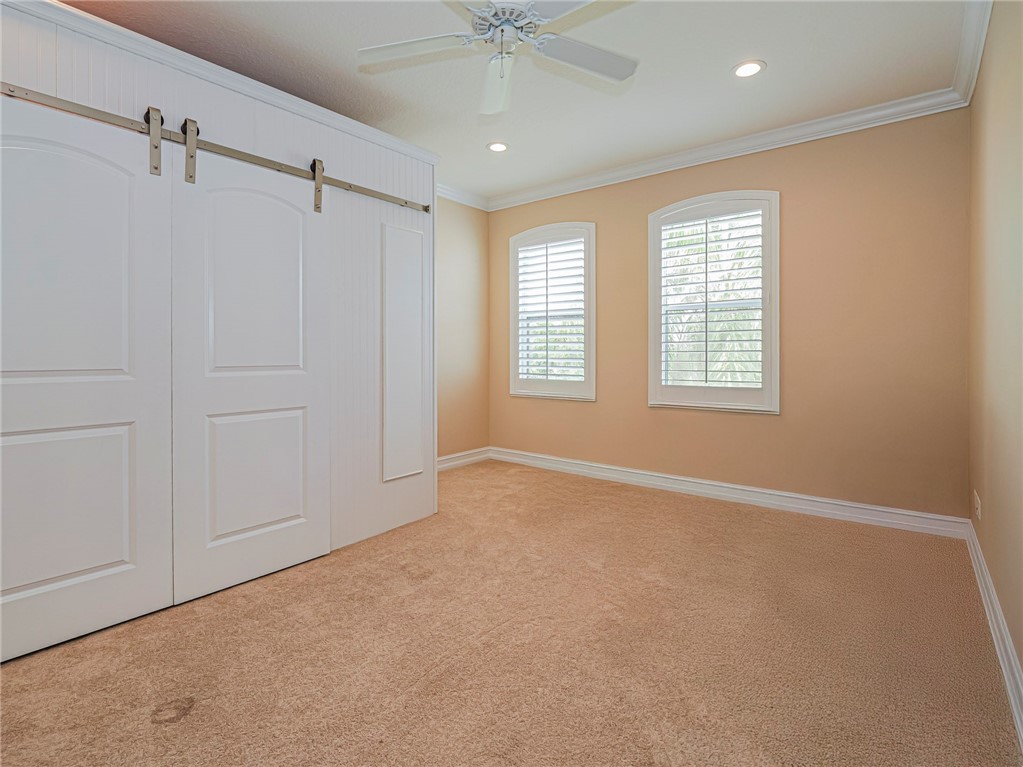 4570 Bridgepointe Way, Unit 148 Vero Beach, FL 32967 - Photo 22 of 32 a view of an empty room with a window