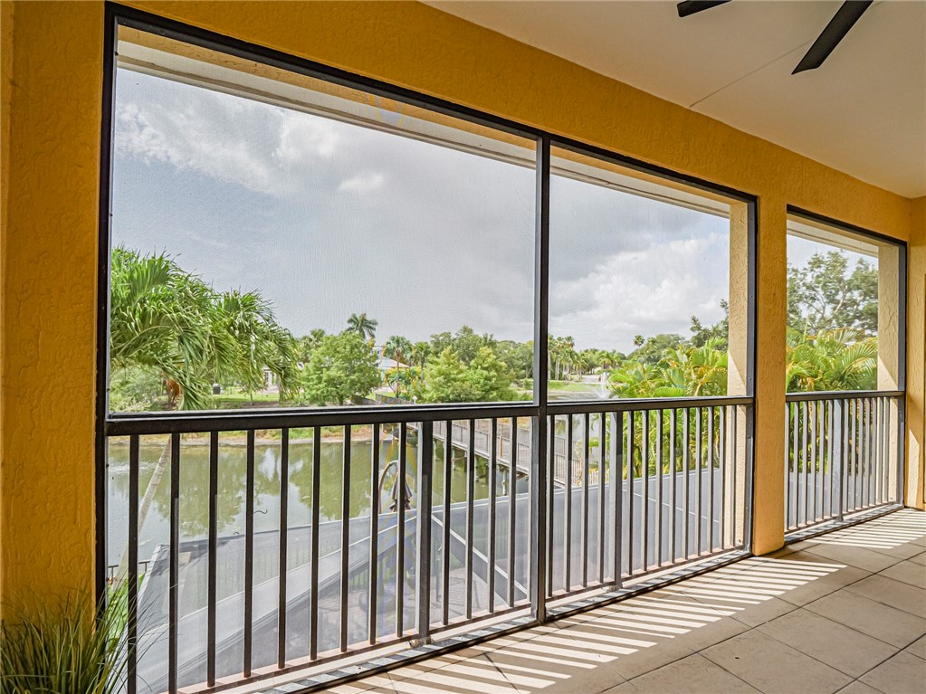4570 Bridgepointe Way, Unit 148 Vero Beach, FL 32967 - Photo 24 of 32 a view of a glass door with a from a window