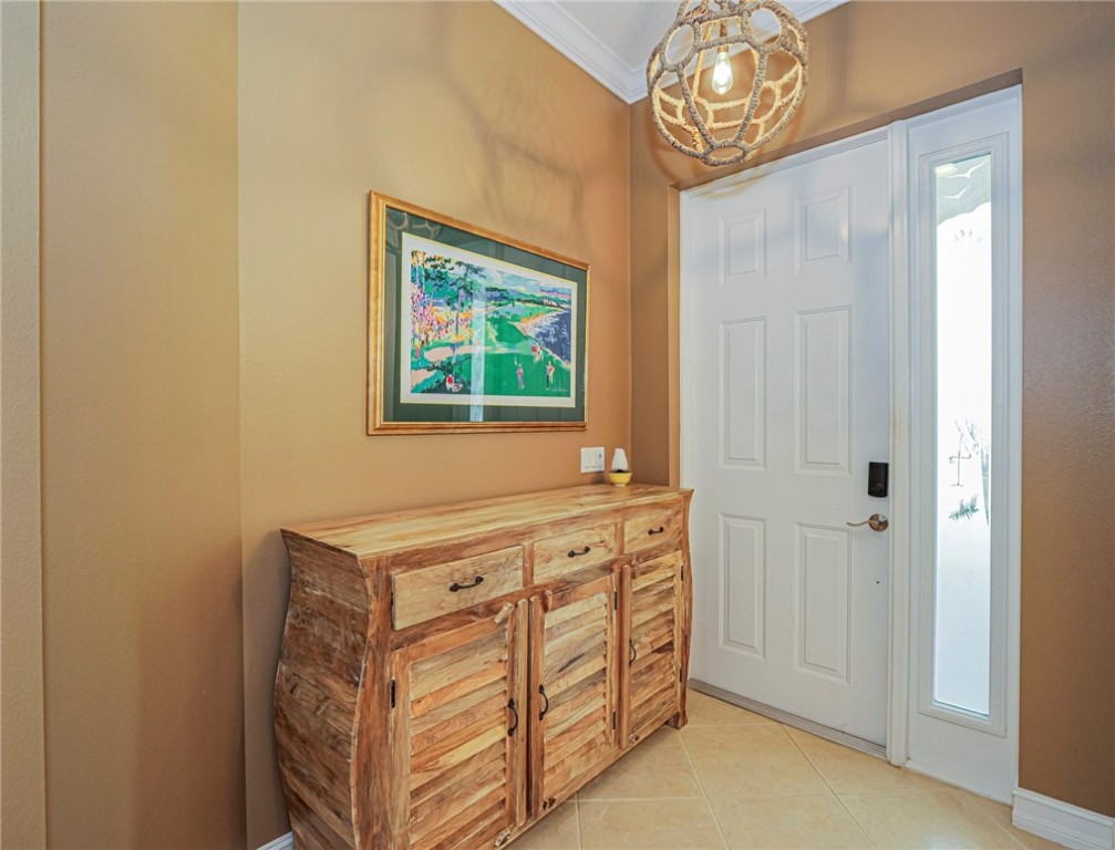 4570 Bridgepointe Way, Unit 148 Vero Beach, FL 32967 - Photo 3 of 32 a view of an entryway with kitchen