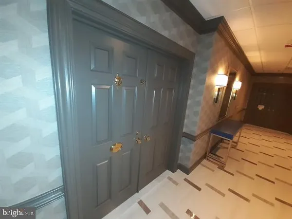 a bathroom with a sink and shower