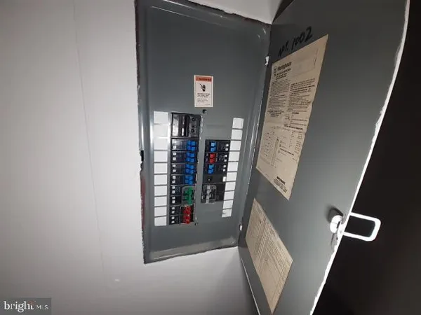 a view of water heater room with stairs