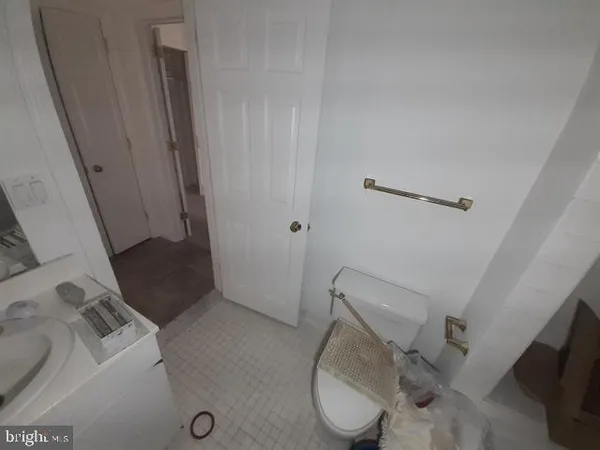 a view of a hallway with a window